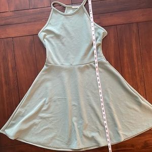 2/$15.  Light olive green woman’s medium dress